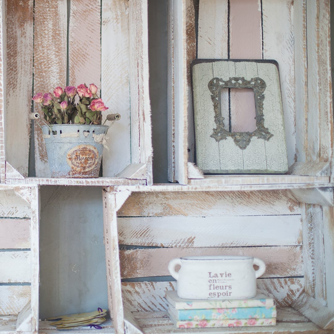 Turn a wooden pallet box into a centerpiece to mix rustic charm with beauty.